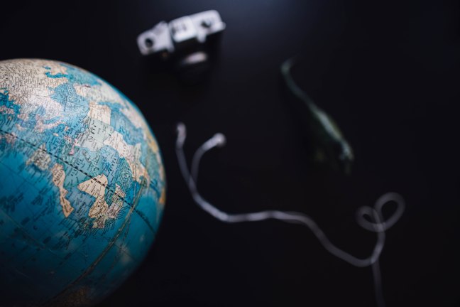 This photo shows a globe and a headset